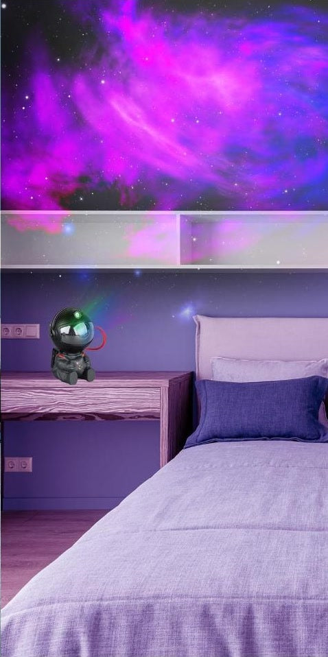 The same bedroom with AURBITAL projecting a nebula on the ceiling